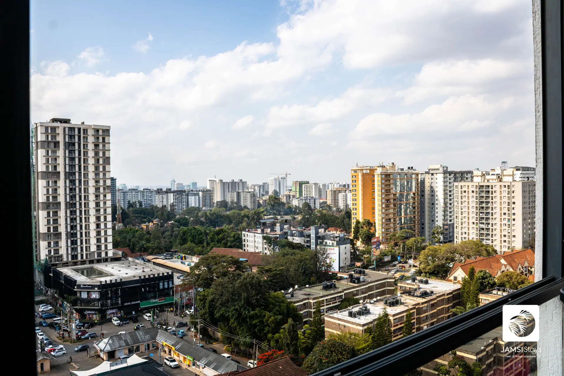 real-estate-market-trends-nairobi.jpg Modern Nairobi skyline showing real estate market growth and residential apartments